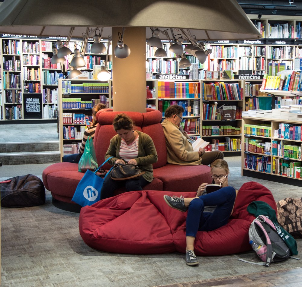 People reading in the teen area